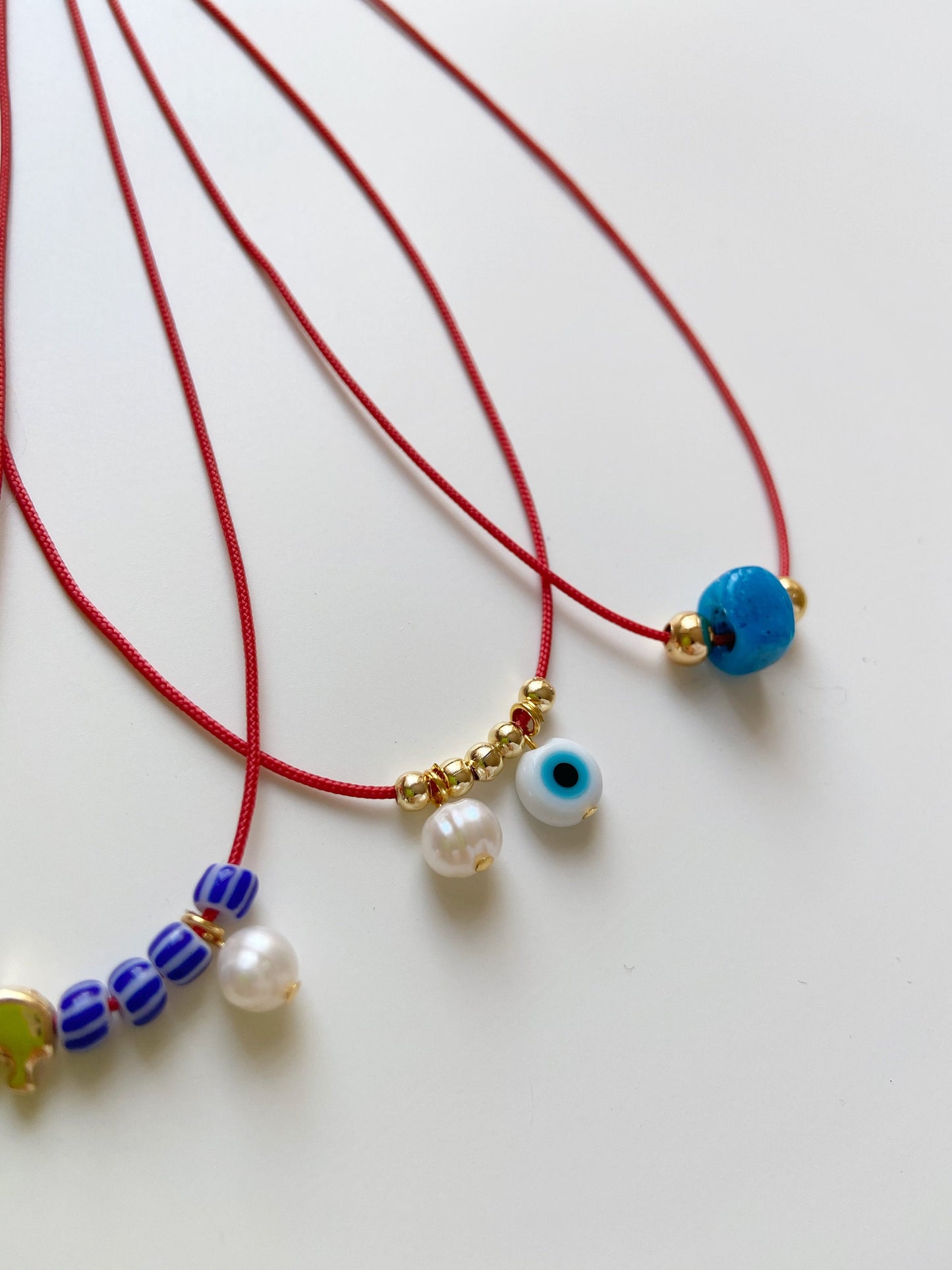 Evil Eye - Pearl Red String Necklace