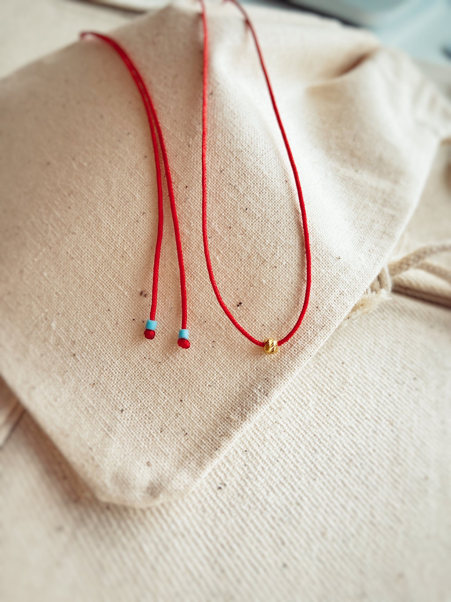 Dorica Ball Red String Necklace