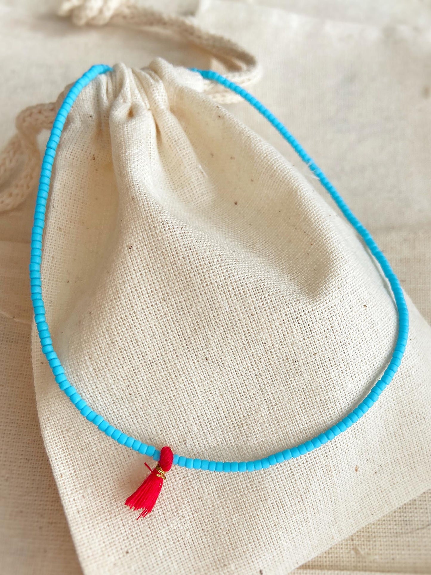 Minimal Blue Matte Bead Red Tassel Necklace