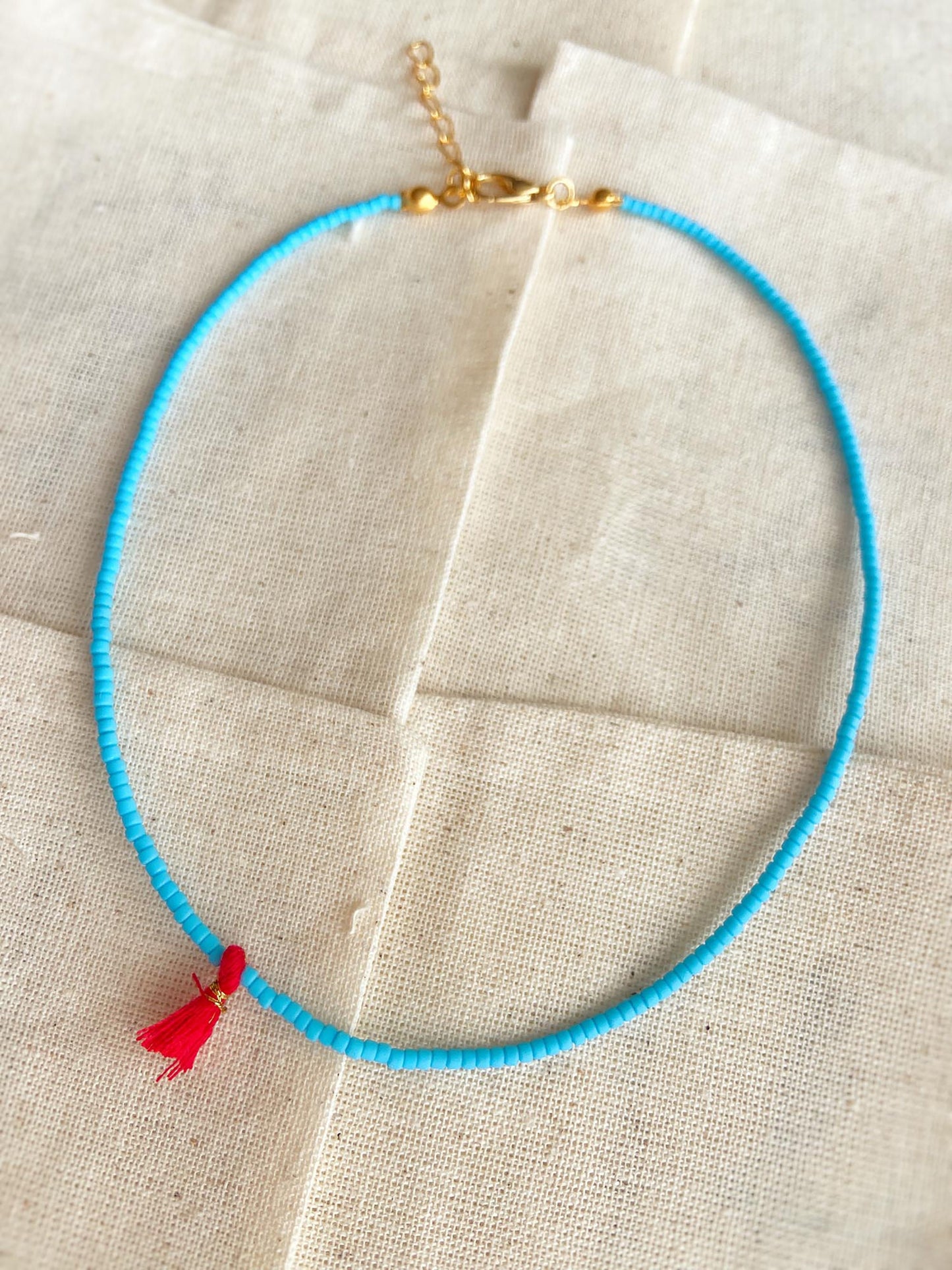 Minimal Blue Matte Bead Red Tassel Necklace