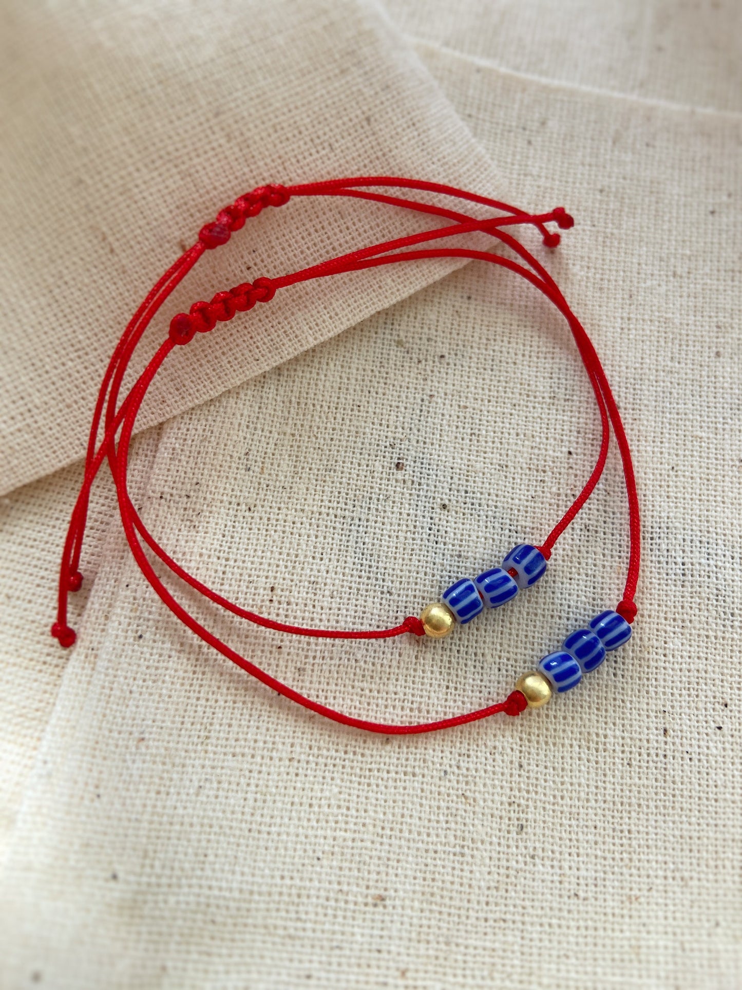 Red String Blue Bead Necklace